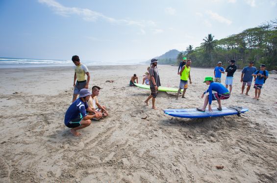 Taking surfing lessons